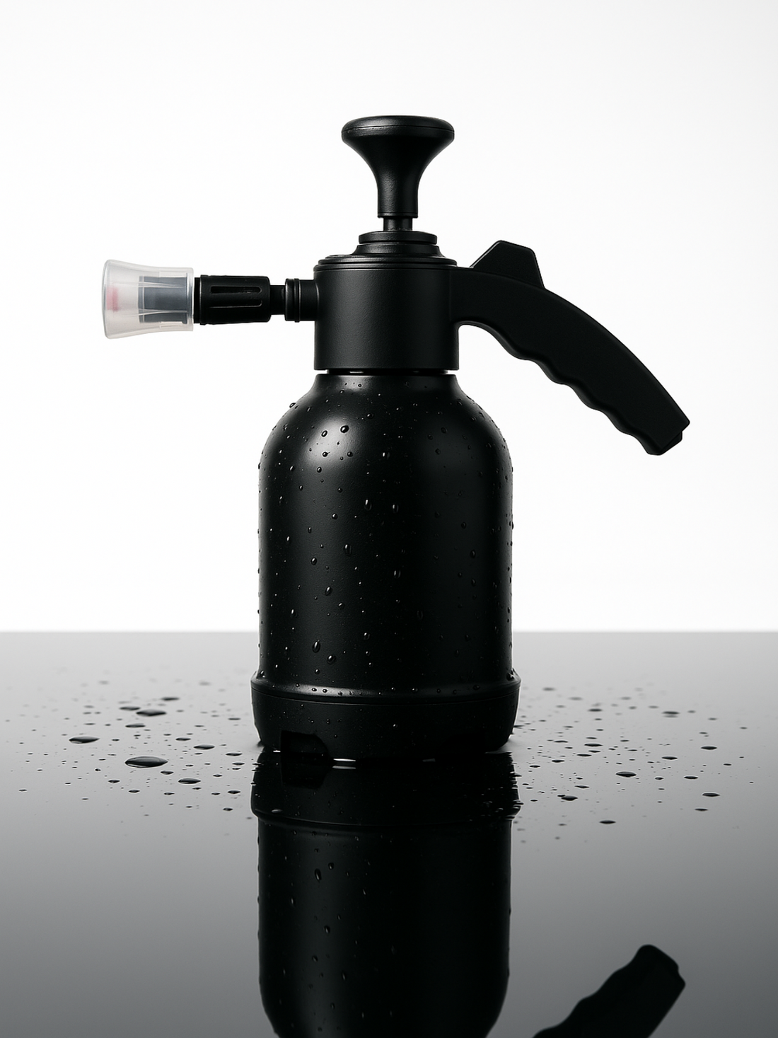 Black foam cannon on a reflective surface with water droplets